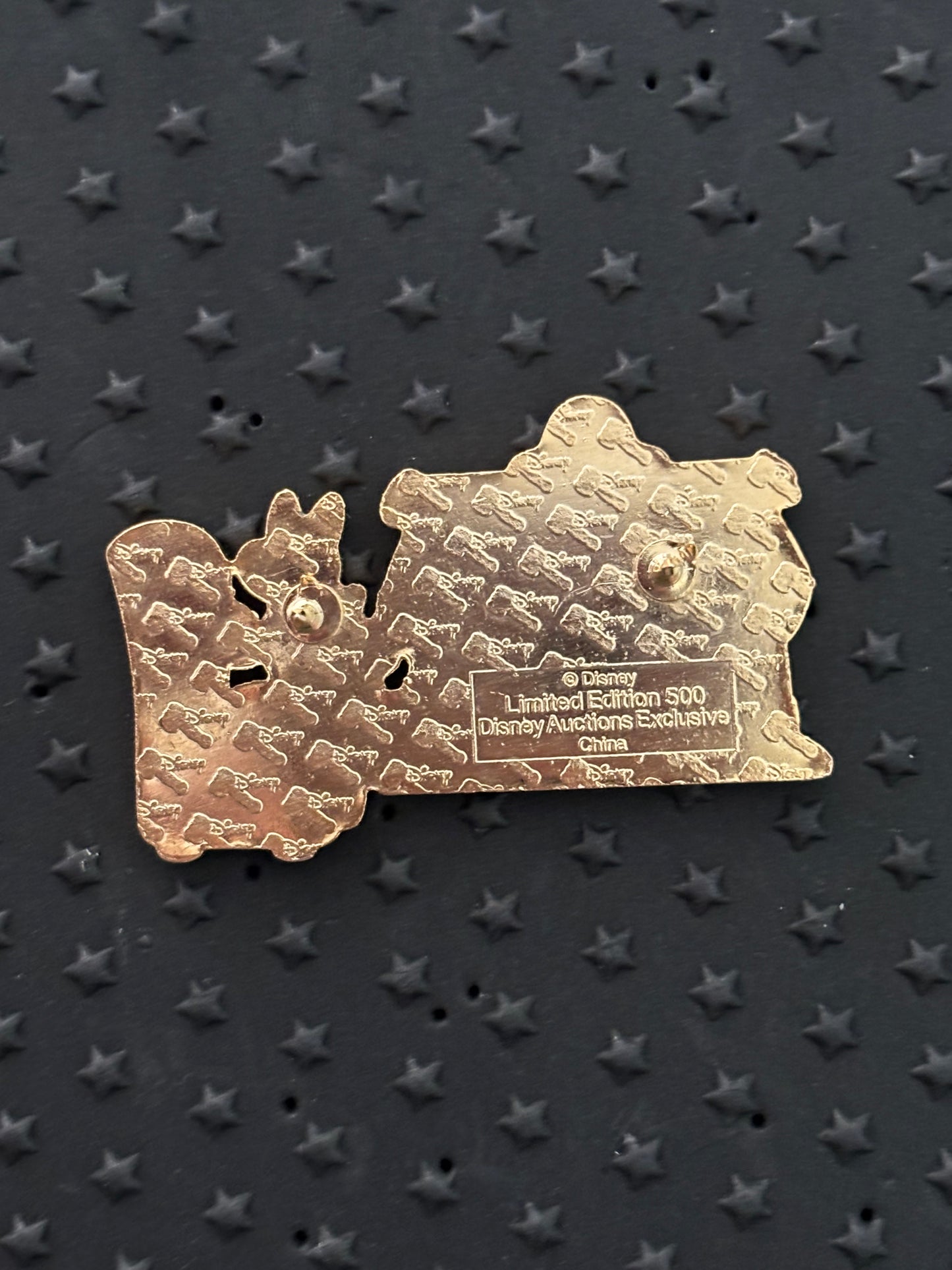 Minnie sitting by the fireplace Christmas Auctions pin